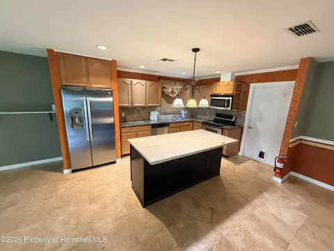 Kitchen - 13435 Linden Dr, Spring Hill, FL 34609 photo 1 of 2