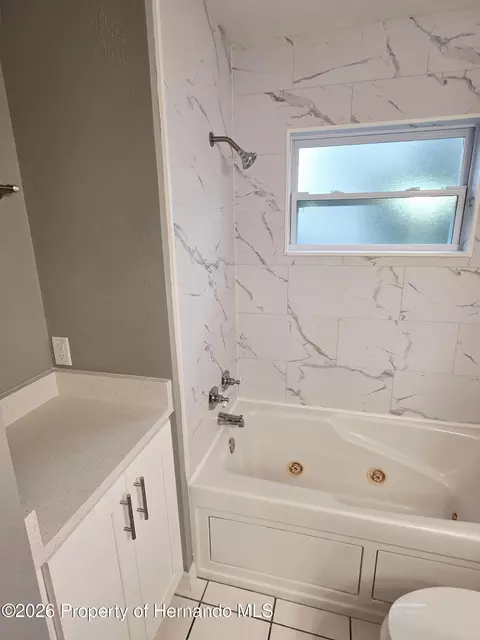 Bath - 7278 Lamplighter St, Spring Hill, FL 34606 photo 2 of 5