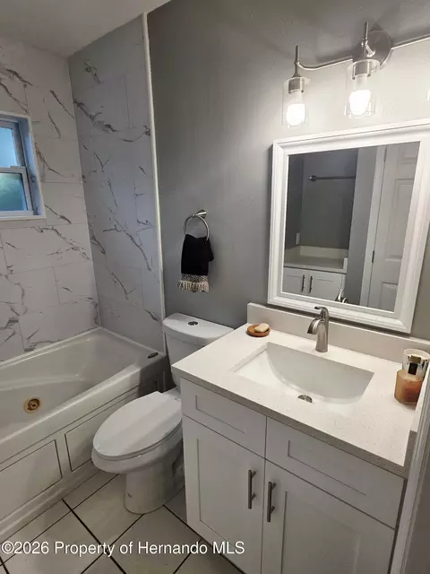 Bath - 7278 Lamplighter St, Spring Hill, FL 34606 photo 1 of 5