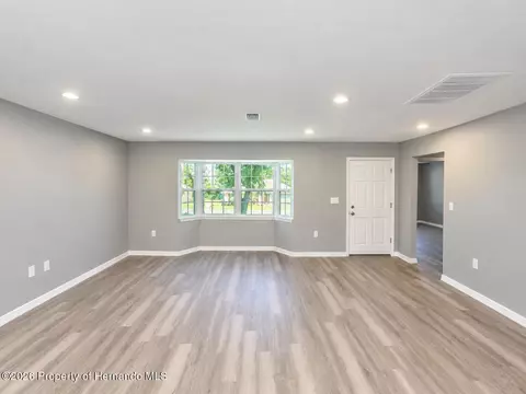 Living - 7278 Lamplighter St, Spring Hill, FL 34606 photo 3 of 8