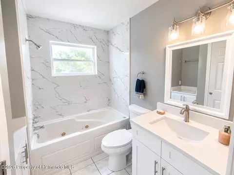 Bath - 7278 Lamplighter St, Spring Hill, FL 34606 photo 1 of 7