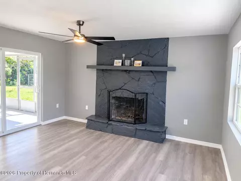 Living - 7278 Lamplighter St, Spring Hill, FL 34606 photo 4 of 8