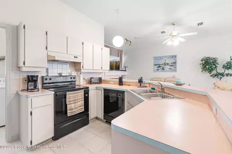 Kitchen - 10419 Upton St, Spring Hill, FL 34608 photo 2 of 2