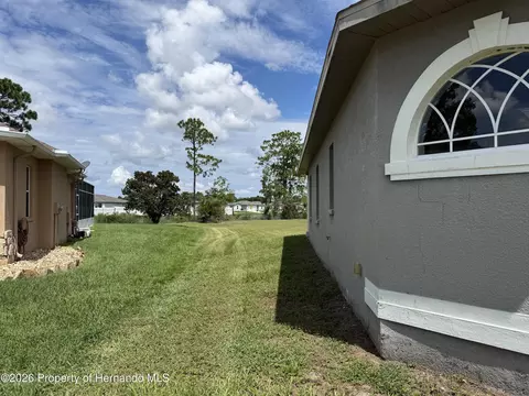 Exterior - 4045 Hanging Moss Loop, Spring Hill, FL 34609 photo 2 of 3