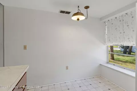 Dining - 6402 Ocean Pines Ln, Spring Hill, FL 34606 photo 2 of 2