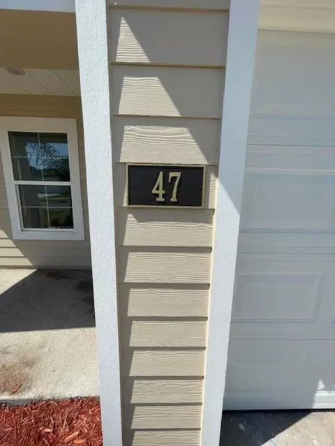 Exterior - 47 Bogey Pl, Bunnell, FL 32110 photo 2 of 19