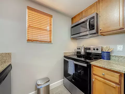 Kitchen - 5930 A1a S UNIT 9E, Saint Augustine, FL 32080 photo 3 of 6