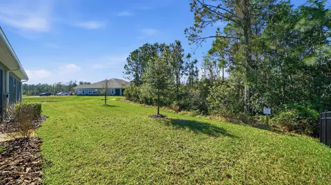 Exterior - 74 Wrendale Loop, Ormond Beach, FL 32174 photo 7 of 13