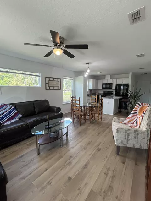 Living - 890 Helen St, Saint Augustine, FL 32084 photo 11 of 12