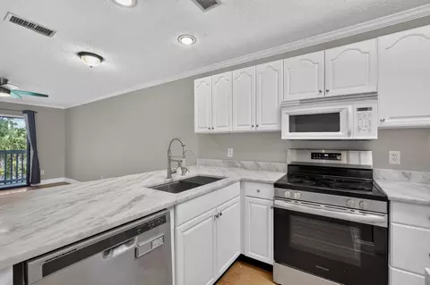 Kitchen - 650 W Pope Rd #249, Saint Augustine, FL 32080 photo 2 of 3