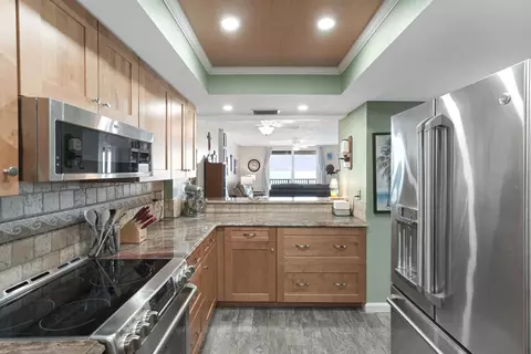 Kitchen - 111 S Atlantic Ave #702, Ormond Beach, FL 32176 photo 2 of 3