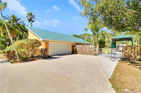 Exterior - 10941 SW Hawkview Cir, Stuart, FL 34997 photo 4 of 10