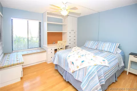 Bedroom - 4490 NE Sandpebble Trce #105, Stuart, FL 34996 photo 3 of 4