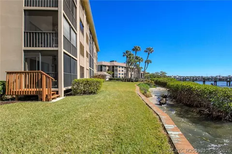 Exterior - 4490 NE Sandpebble Trce #105, Stuart, FL 34996 photo 6 of 10