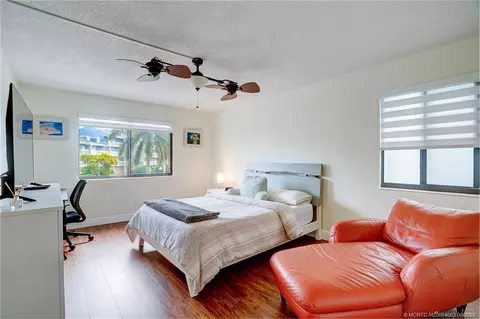Bedroom - 10 NE Plantation Rd #101, Stuart, FL 34996 photo 1 of 8