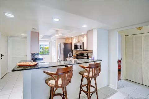Kitchen - 10 NE Plantation Rd #101, Stuart, FL 34996 photo 7 of 7