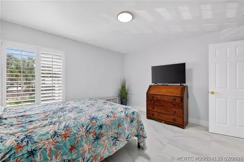 Bedroom - 6433 SE Brandywine Ct #219, Stuart, FL 34997 photo 4 of 5