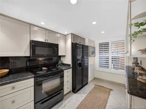 Kitchen - 4680 NE Sandpebble Trce #103, Stuart, FL 34996 photo 2 of 3