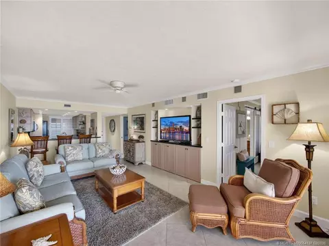 Living - 4680 NE Sandpebble Trce #103, Stuart, FL 34996 photo 2 of 3