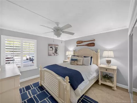 Bedroom - 4680 NE Sandpebble Trce #103, Stuart, FL 34996 photo 4 of 5