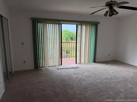 Bedroom - 80 SW Blackburn Ter #3, Stuart, FL 34997 photo 2 of 9