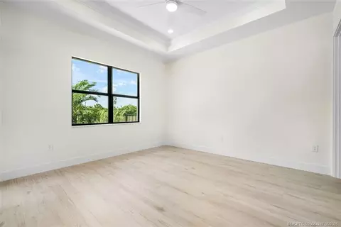 Bedroom - 5101 SE Burning Tree Cir, Stuart, FL 34997 photo 1 of 8