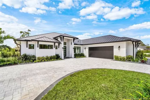 Exterior - 5101 SE Burning Tree Cir, Stuart, FL 34997 photo 5 of 14