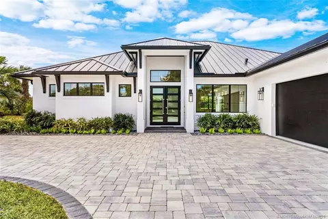 Exterior - 5101 SE Burning Tree Cir, Stuart, FL 34997 photo 4 of 14