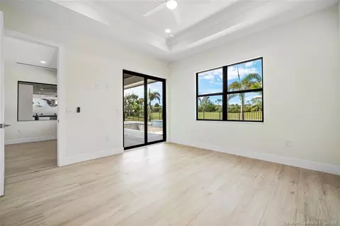 Bedroom - 5101 SE Burning Tree Cir, Stuart, FL 34997 photo 3 of 8