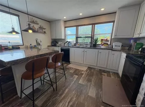 3081 E Mayaguana Ln, Atlantis, FL 33462