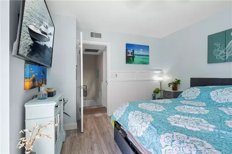 Bedroom - 6057 SE Riverboat Dr, Stuart, FL 34997 photo 3 of 4