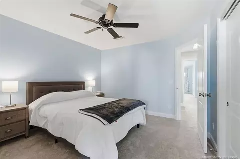 Bedroom - 5657 SE Foxcross Pl, Stuart, FL 34997 photo 6 of 10