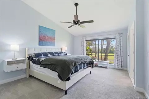 Bedroom - 5657 SE Foxcross Pl, Stuart, FL 34997 photo 1 of 10