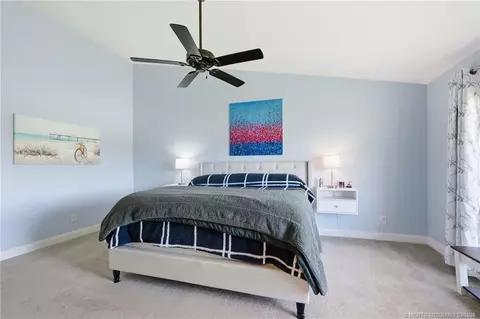Bedroom - 5657 SE Foxcross Pl, Stuart, FL 34997 photo 2 of 10