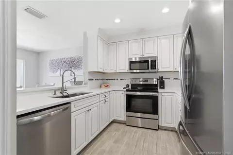 Kitchen - 5657 SE Foxcross Pl, Stuart, FL 34997 photo 2 of 2