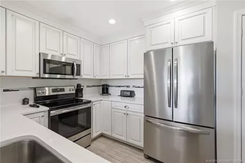 Kitchen - 5657 SE Foxcross Pl, Stuart, FL 34997 photo 1 of 2