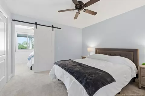Bedroom - 5657 SE Foxcross Pl, Stuart, FL 34997 photo 5 of 10