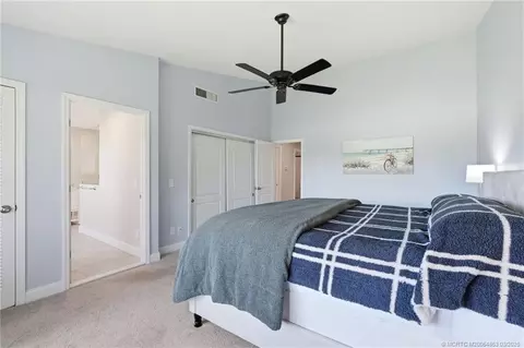 Bedroom - 5657 SE Foxcross Pl, Stuart, FL 34997 photo 3 of 10