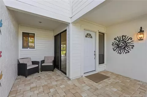 Exterior - 5657 SE Foxcross Pl, Stuart, FL 34997 photo 4 of 10