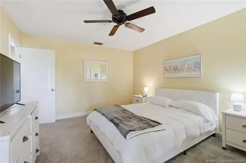 Bedroom - 5657 SE Foxcross Pl, Stuart, FL 34997 photo 8 of 10