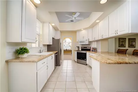 Kitchen - 1477 SW Eagleglen Pl, Stuart, FL 34997 photo 2 of 2
