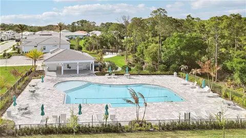 Exterior - 7030 SE Haven Ln, Stuart, FL 34997 photo 6 of 7