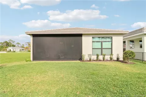 Exterior - 7030 SE Haven Ln, Stuart, FL 34997 photo 3 of 7