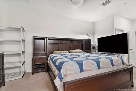 Bedroom - 9456 SW Merlin Ct, Stuart, FL 34997 photo 1 of 5