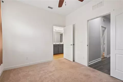Bedroom - 9456 SW Merlin Ct, Stuart, FL 34997 photo 4 of 5