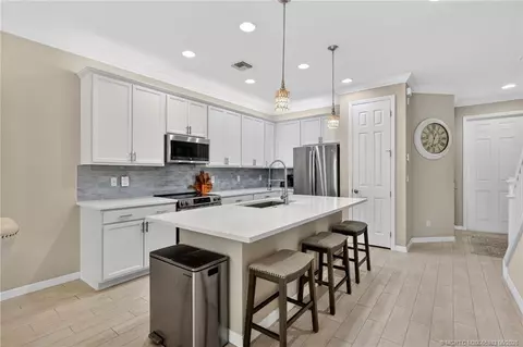 Kitchen - 587 SW Glen Crest Way, Stuart, FL 34997 photo 2 of 6