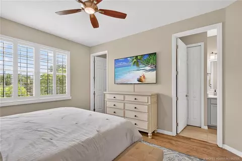Bedroom - 587 SW Glen Crest Way, Stuart, FL 34997 photo 2 of 6