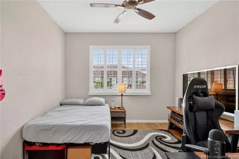 Bedroom - 587 SW Glen Crest Way, Stuart, FL 34997 photo 6 of 6