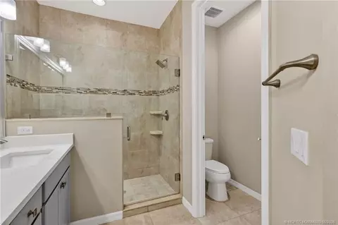 Bath - 587 SW Glen Crest Way, Stuart, FL 34997 photo 3 of 4