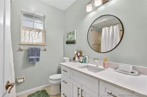 Bath - 671 SE Pin Oak Ter, Stuart, FL 34997 photo 4 of 7